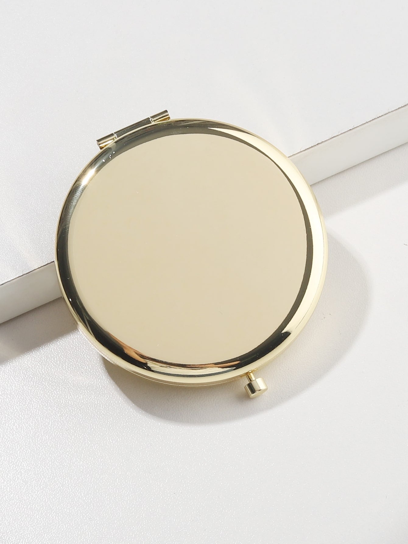 Compact Mirrors